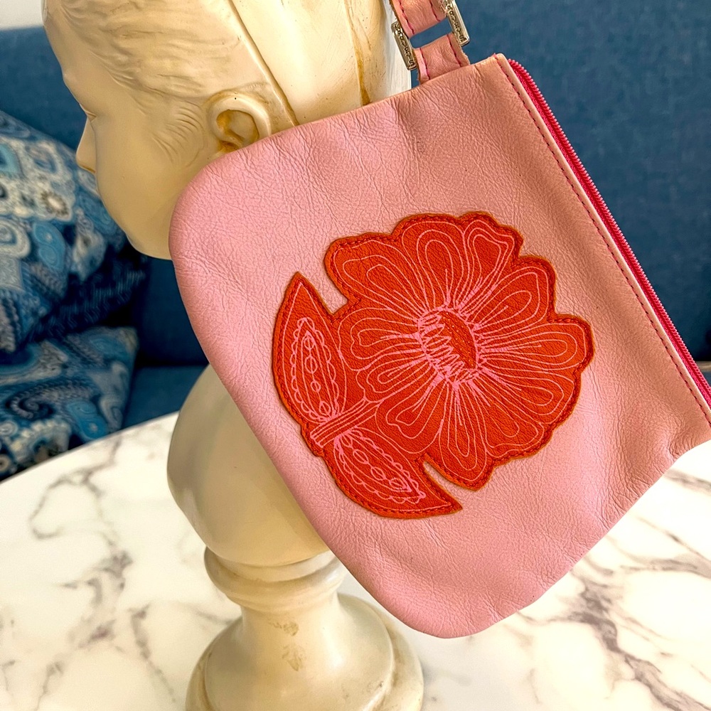 The cutest pink leather wristlet bag with zipper!